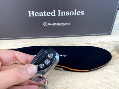 Fernbedienung für beheizbare Einlegesohlen.