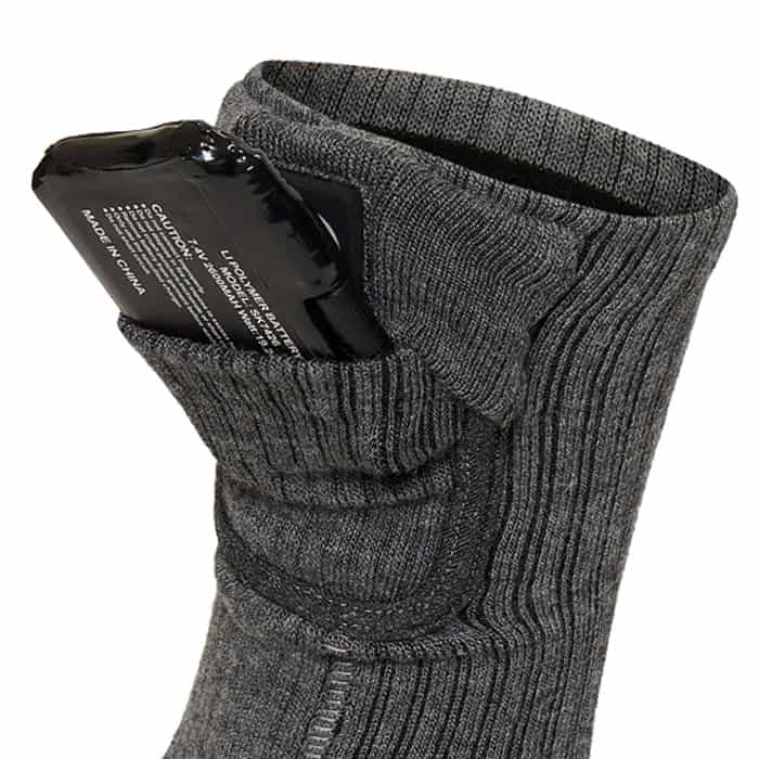 Batterij in zakje van verwarmde sok